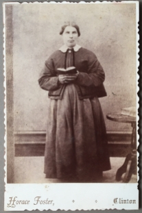 Photo 1: standing woman. Photographer Horace Foster, Clinton, Ontario.